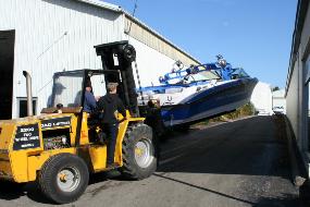 Our staff, giving serving to a boat