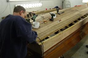 Our staff, repairing to a boat